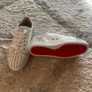 White Sneakers with Silver Studs and Red Soles